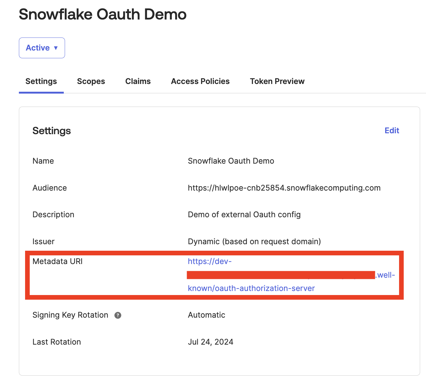 The Okta API settings page with the metadata URI highlighted